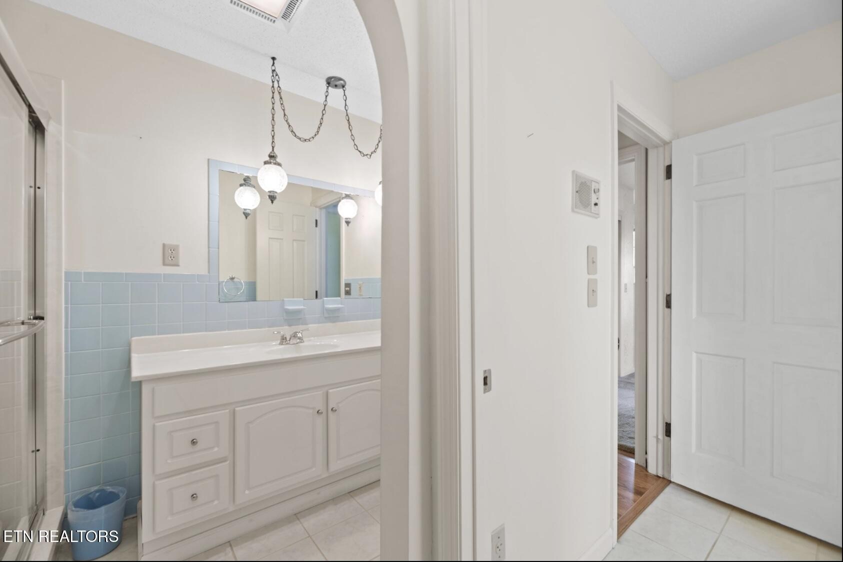 571 Calhoun Drive Greenback, TN 37742 - Photo 36 of 44 a bathroom with a sink vanity and a mirror