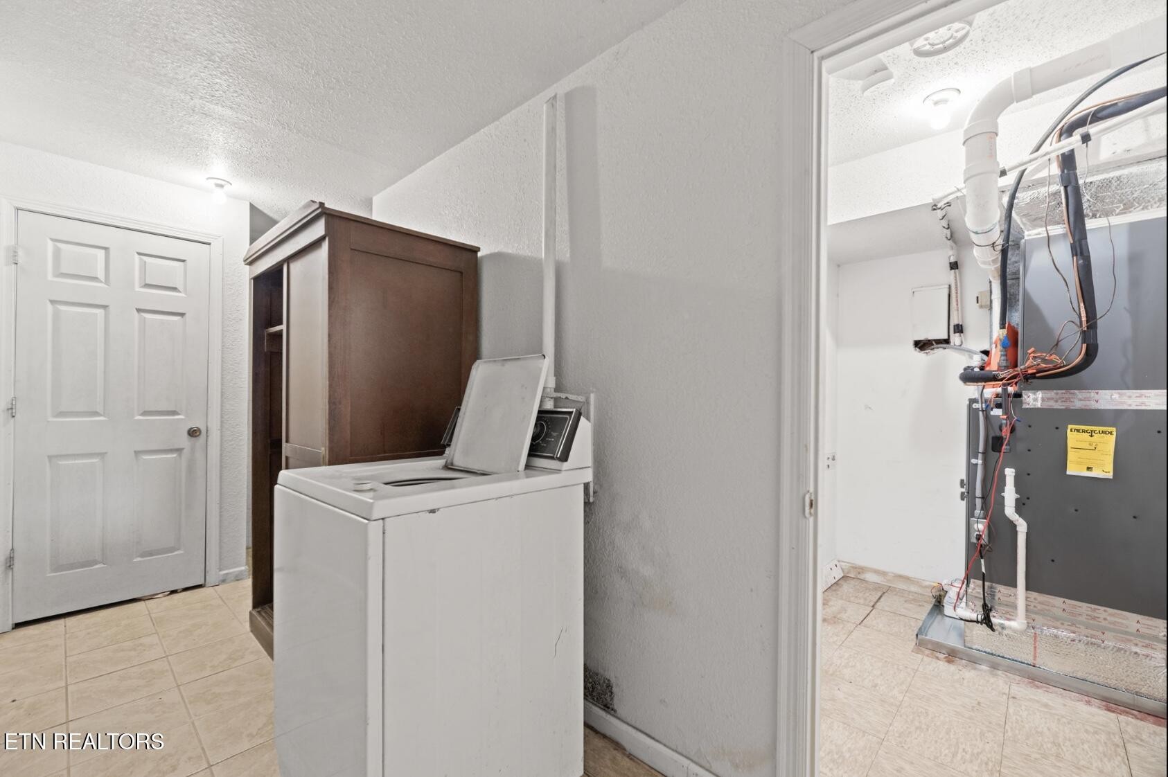 571 Calhoun Drive Greenback, TN 37742 - Photo 39 of 44 a utility room with dryer and washer