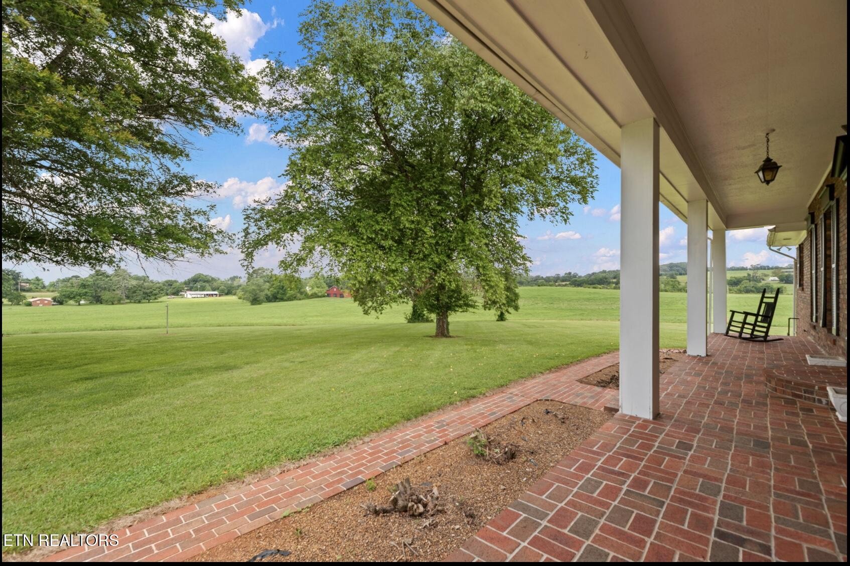 571 Calhoun Drive Greenback, TN 37742 - Photo 5 of 44 a view of a house with a big yard