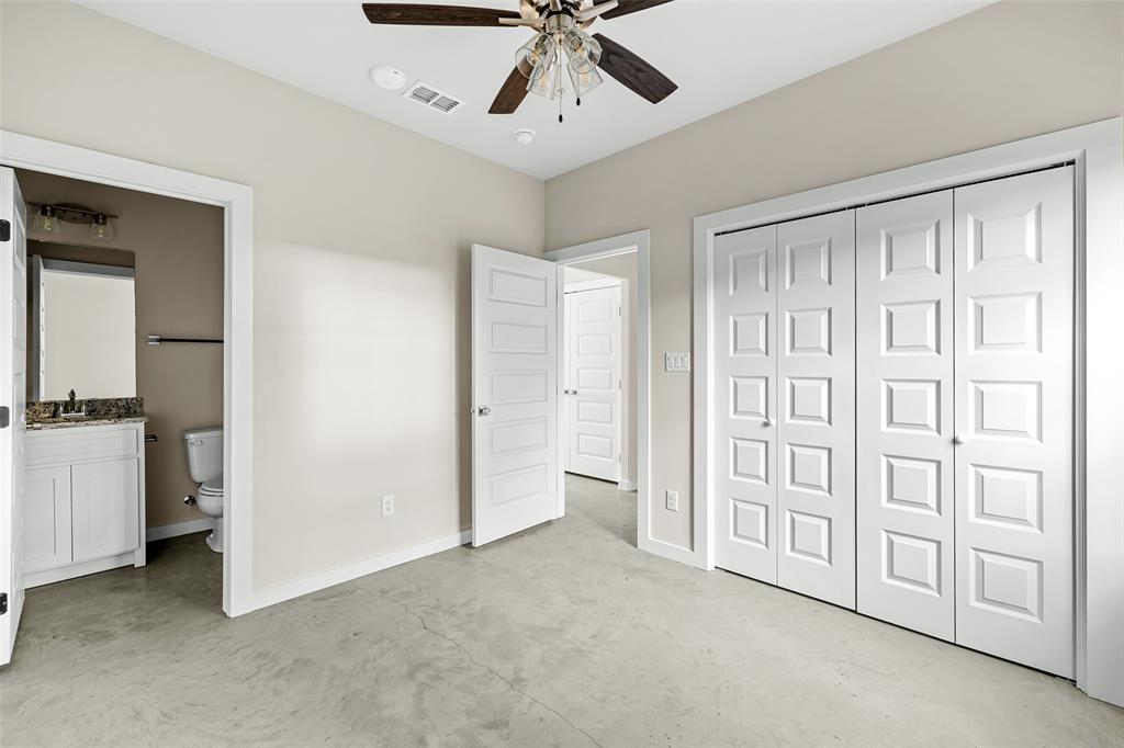 2290 West Tarleton Street, Unit 105 Stephenville, TX 76401 - Photo 9 of 15 a view of an empty room with a window