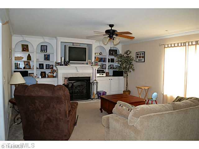 4580 Scythe Road Julian, NC 27283 - Photo 4 of 13 Den/Family/Great Room. Den has built in shelves, fireplace w/gas logs
