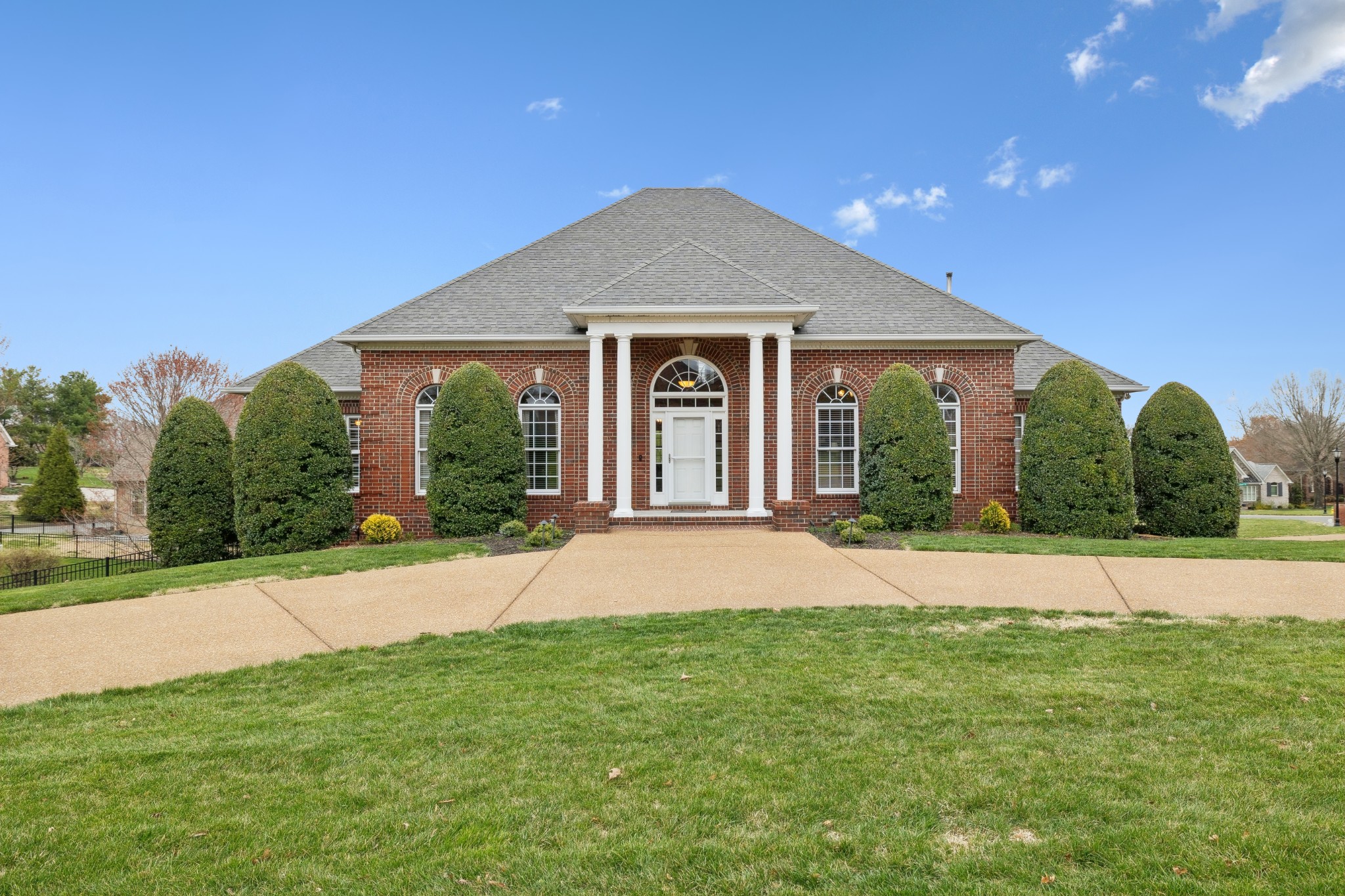 2108 Rodman Boulevard Gallatin, TN 37066 - Photo 2 of 45 a front view of a house with a yard and garage