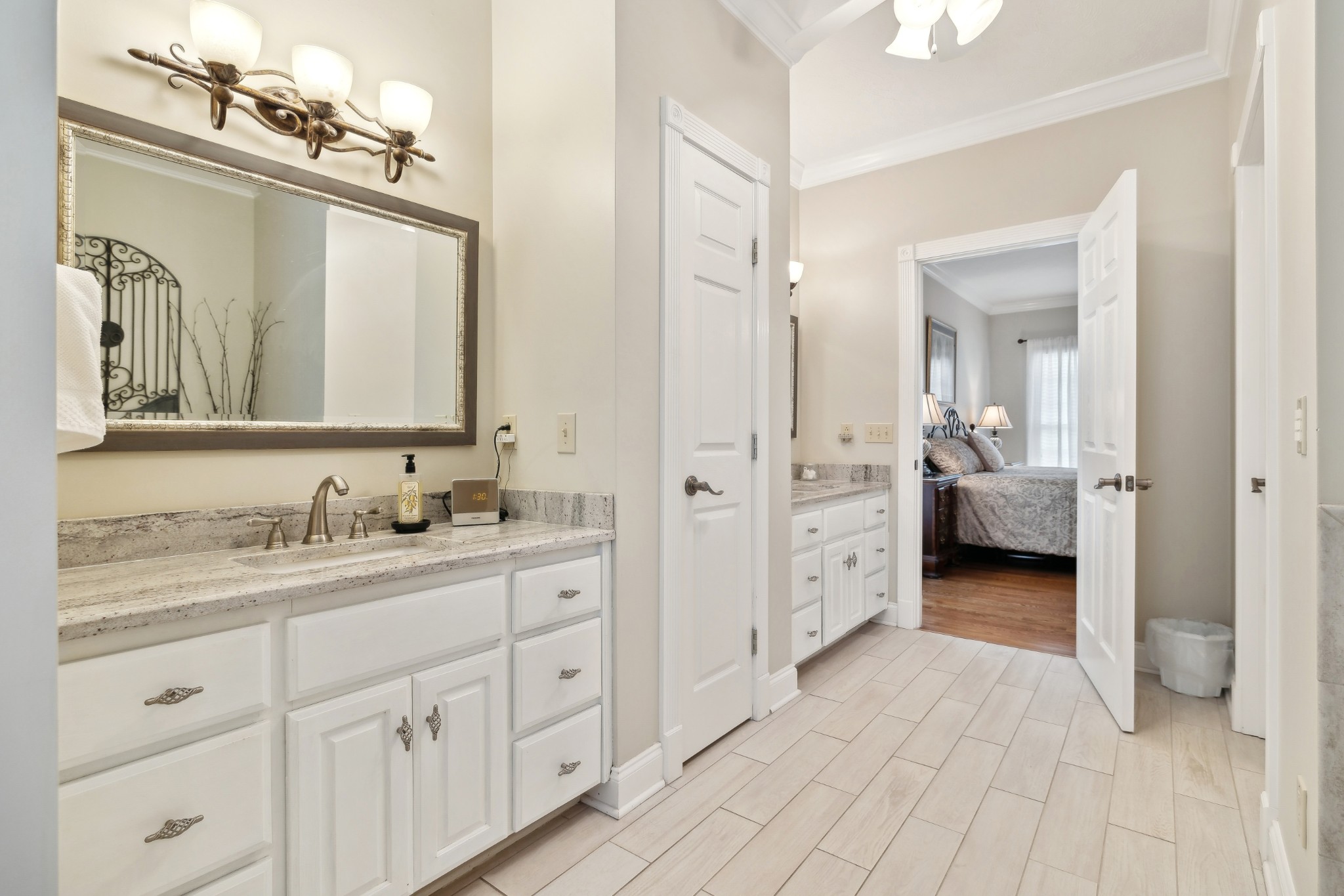 2108 Rodman Boulevard Gallatin, TN 37066 - Photo 22 of 45 a en suite bathroom with a double vanity sink and a mirror