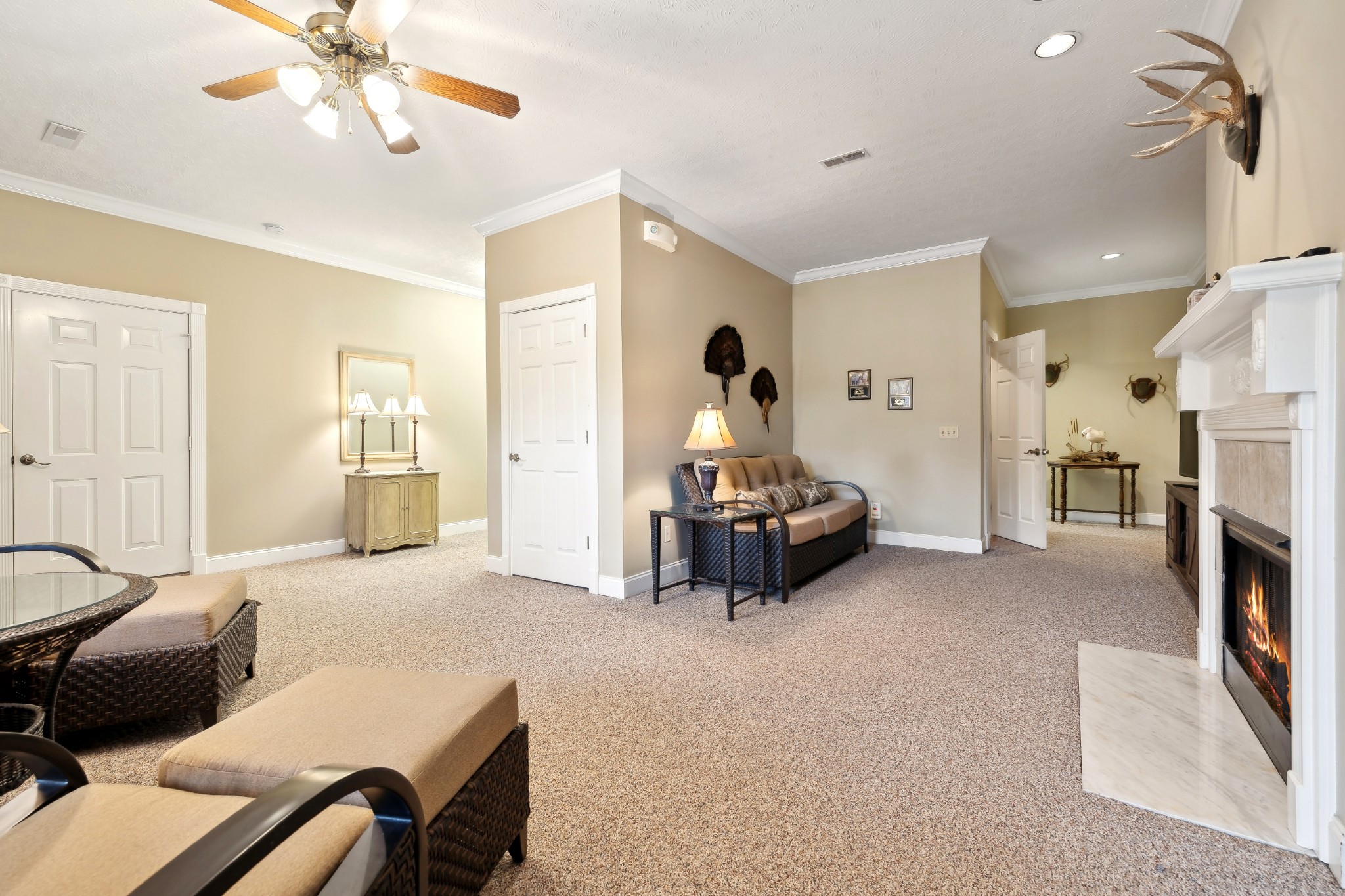 2108 Rodman Boulevard Gallatin, TN 37066 - Photo 35 of 45 a bedroom with furniture and a chandelier