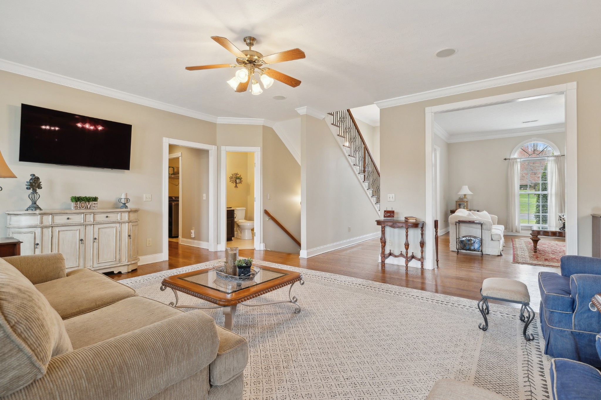 2108 Rodman Boulevard Gallatin, TN 37066 - Photo 5 of 45 a living room with furniture and a chandelier