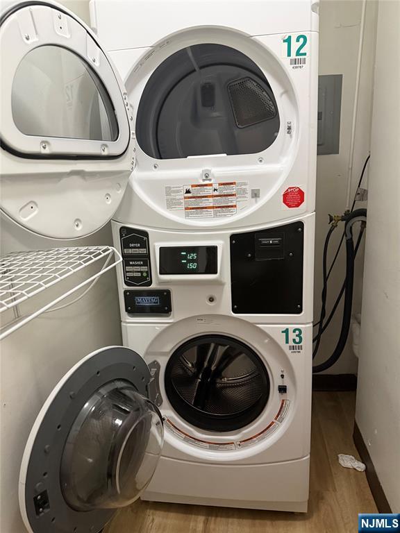 265 Main Street, Unit 702 Ridgefield Park, NJ 07660 - Photo 7 of 20 a utility room with dryer and washer