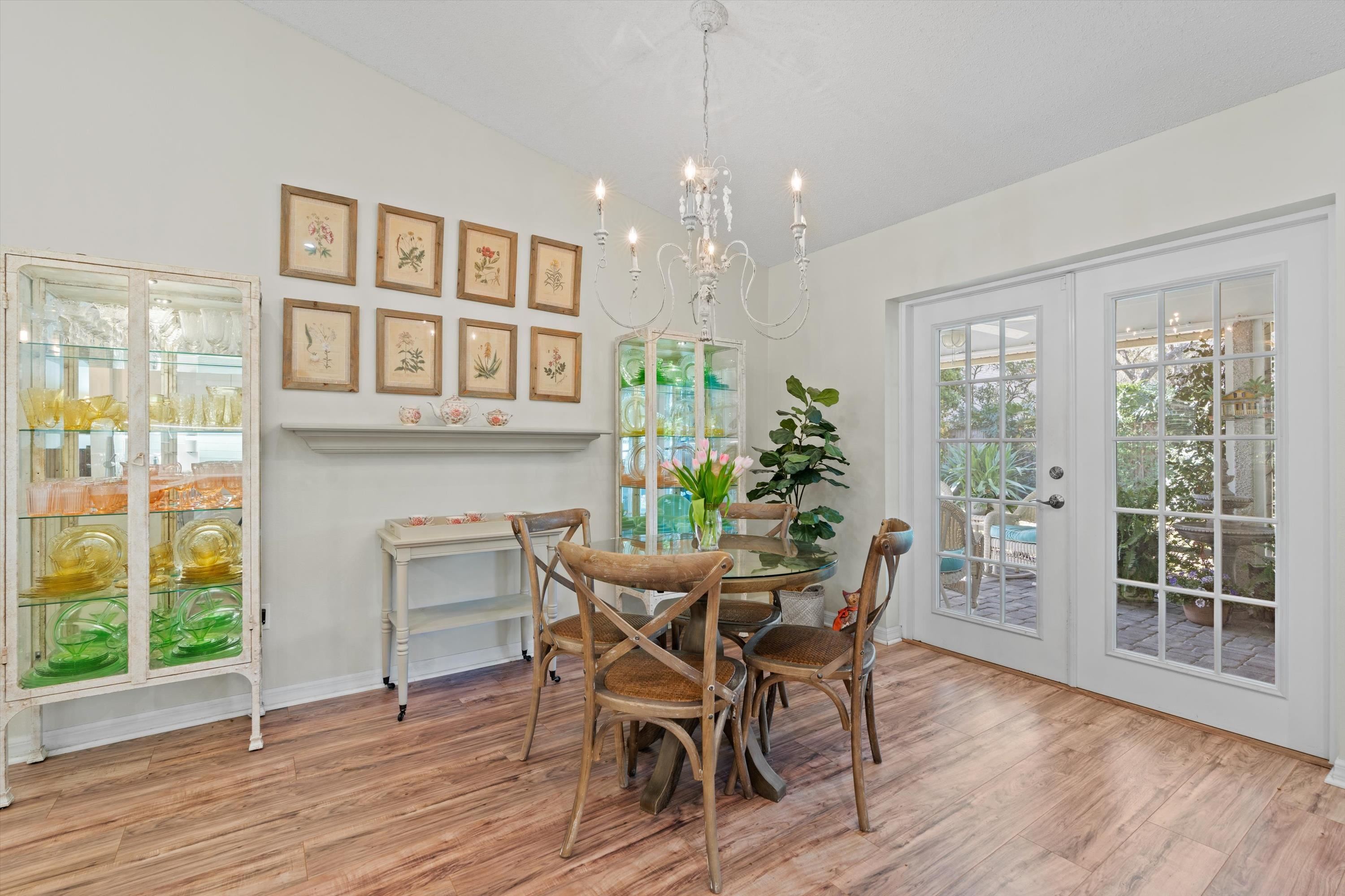 222 Bonita Road St. Augustine, FL 32086 - Photo 14 of 46 a view of a dining room with furniture window and wooden floor