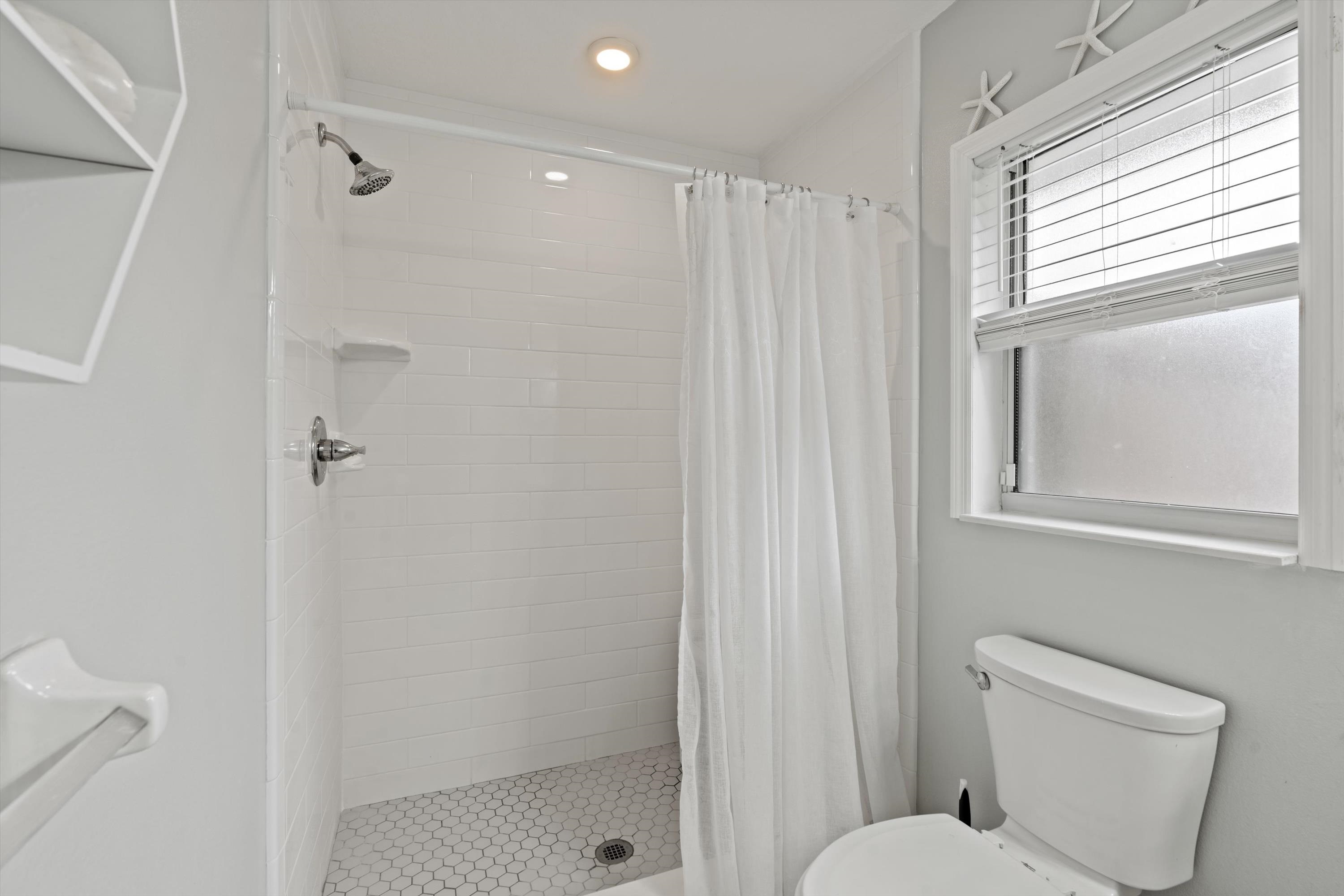 222 Bonita Road St. Augustine, FL 32086 - Photo 25 of 46 a bathroom with a shower toilet and sink