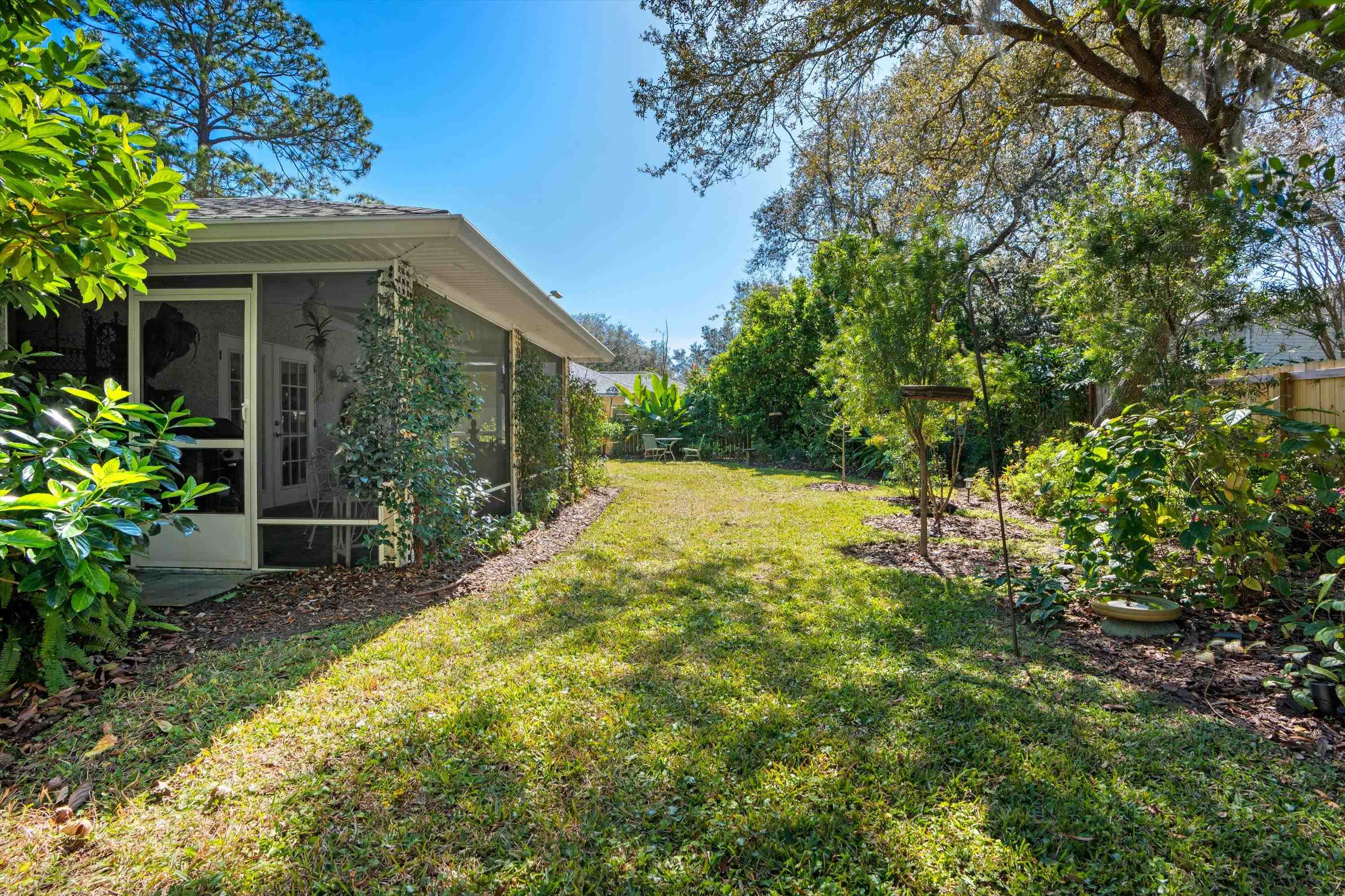 222 Bonita Road St. Augustine, FL 32086 - Photo 33 of 46 a view of a house with backyard and sitting area