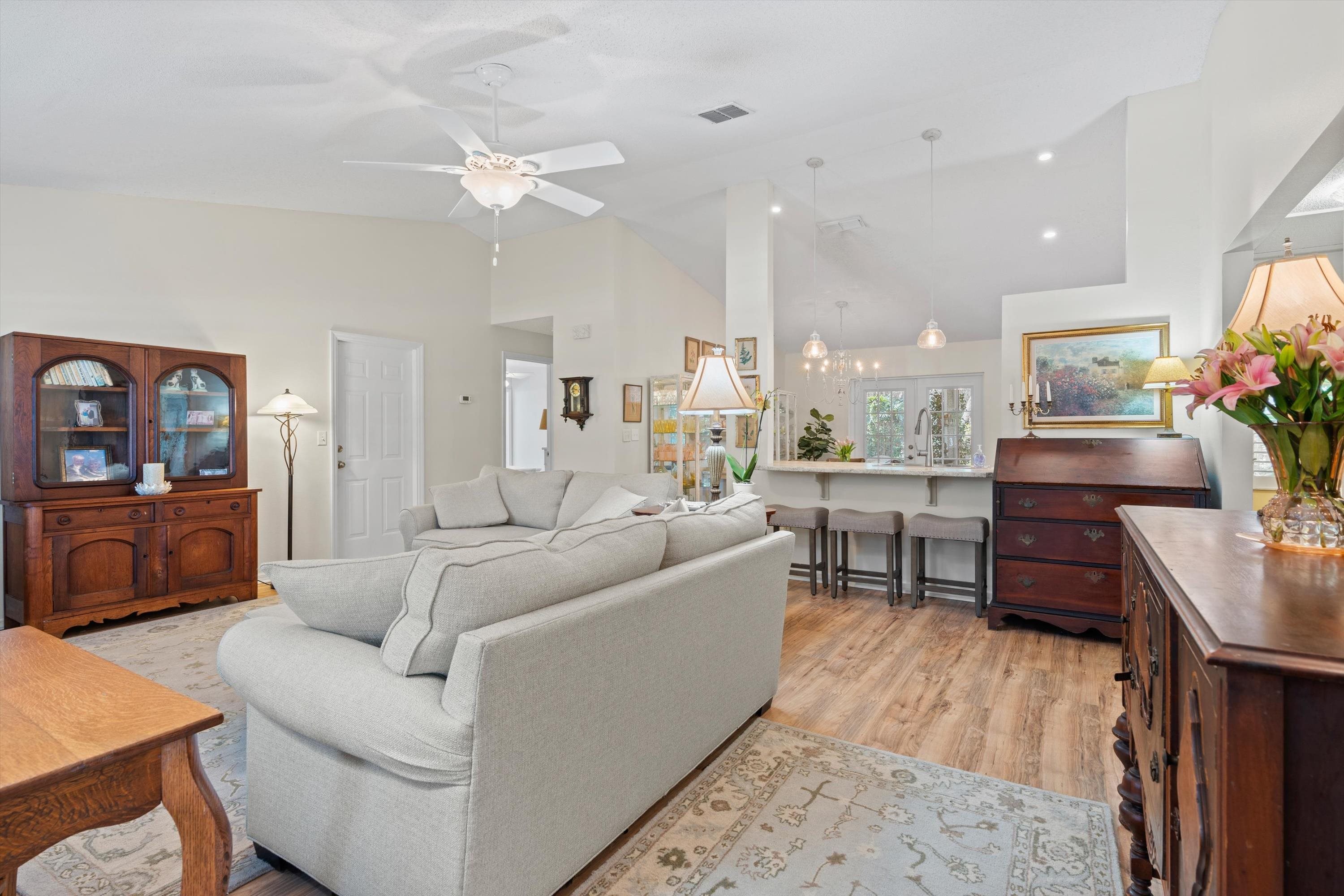 222 Bonita Road St. Augustine, FL 32086 - Photo 7 of 46 a living room with furniture and a wooden floor