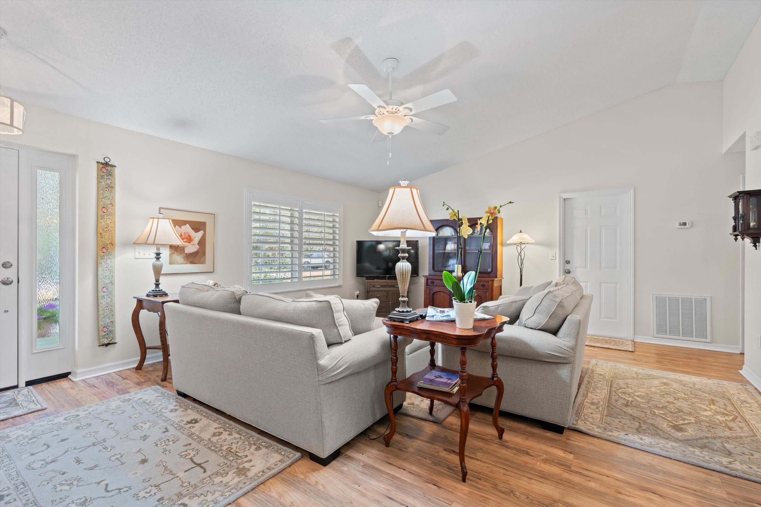 222 Bonita Road St. Augustine, FL 32086 - Photo 8 of 46 a living room with furniture and a fireplace