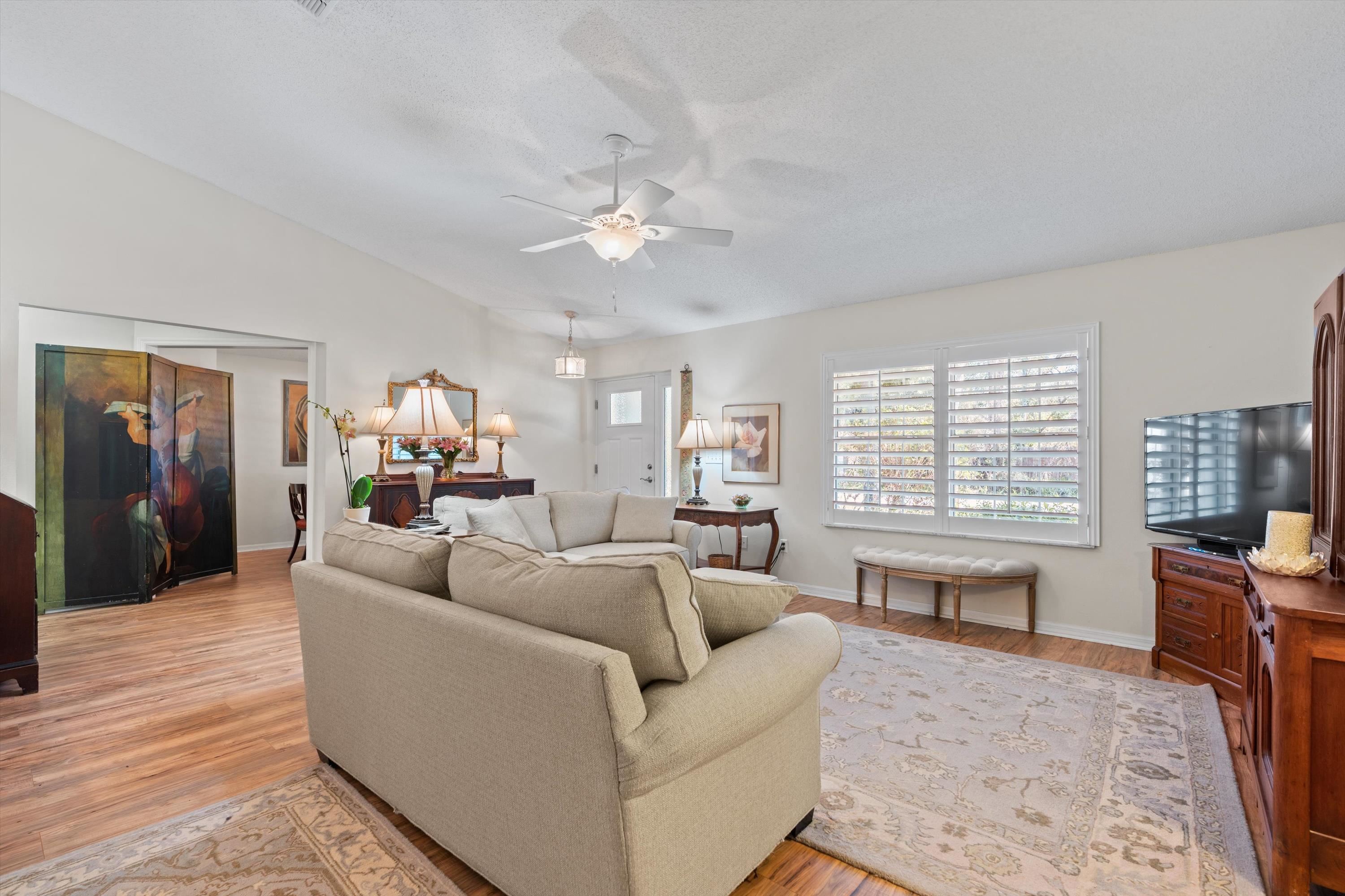 222 Bonita Road St. Augustine, FL 32086 - Photo 9 of 46 a living room with furniture and a large window