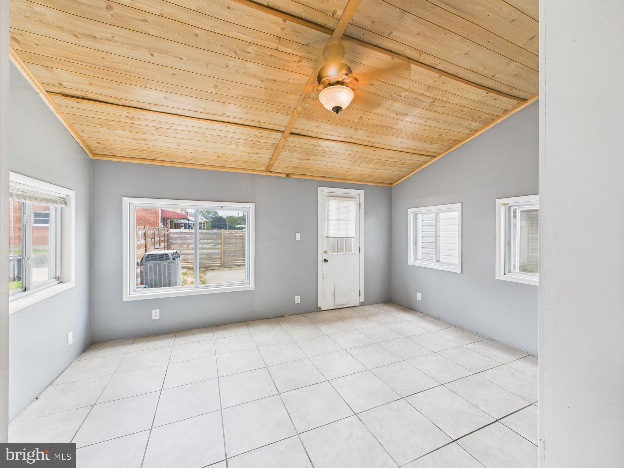 2743 Kirkleigh Road Dundalk, MD 21222 - Photo 19 of 31 a view of an empty room with a window