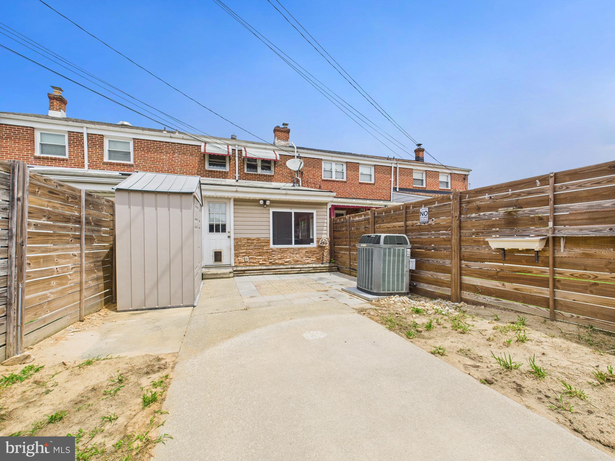 2743 Kirkleigh Road Dundalk, MD 21222 - Photo 25 of 31 a view of a house with a snow in the background