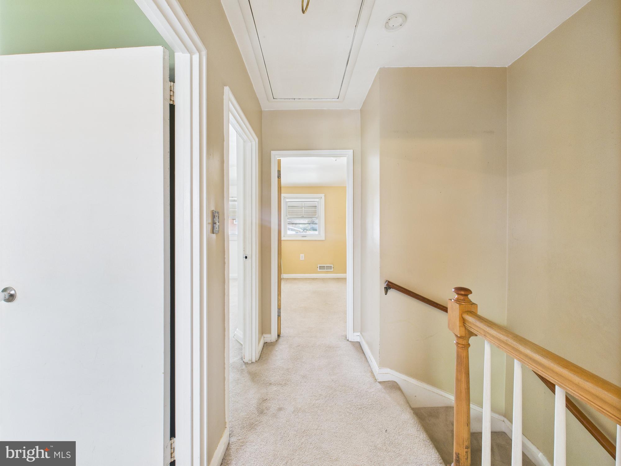 2743 Kirkleigh Road Dundalk, MD 21222 - Photo 9 of 31 a view of a hallway with a white walls