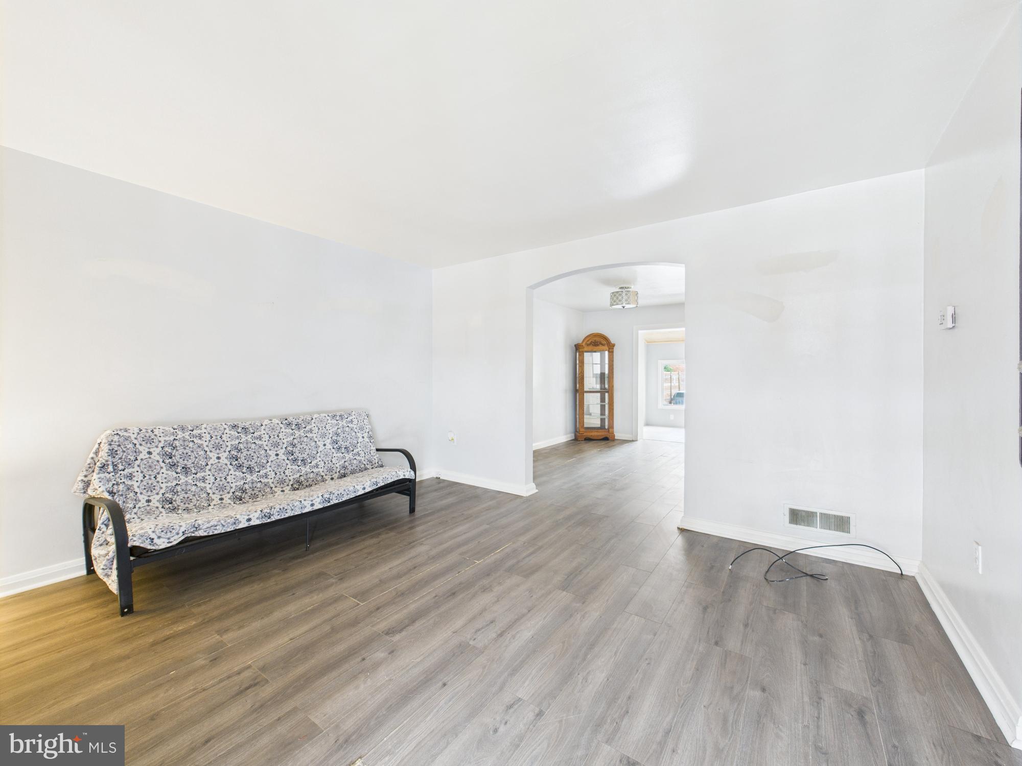 2743 Kirkleigh Road Dundalk, MD 21222 - Photo 10 of 31 a view of livingroom with furniture and wooden floor