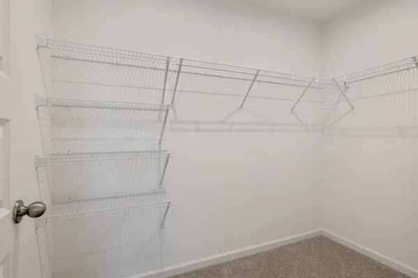 a view of a room with racks on the wall