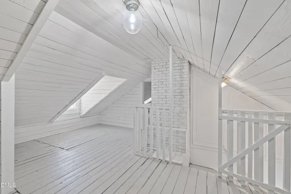 a view of wooden floor in an empty room