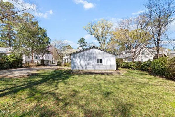 a house with trees in front of it