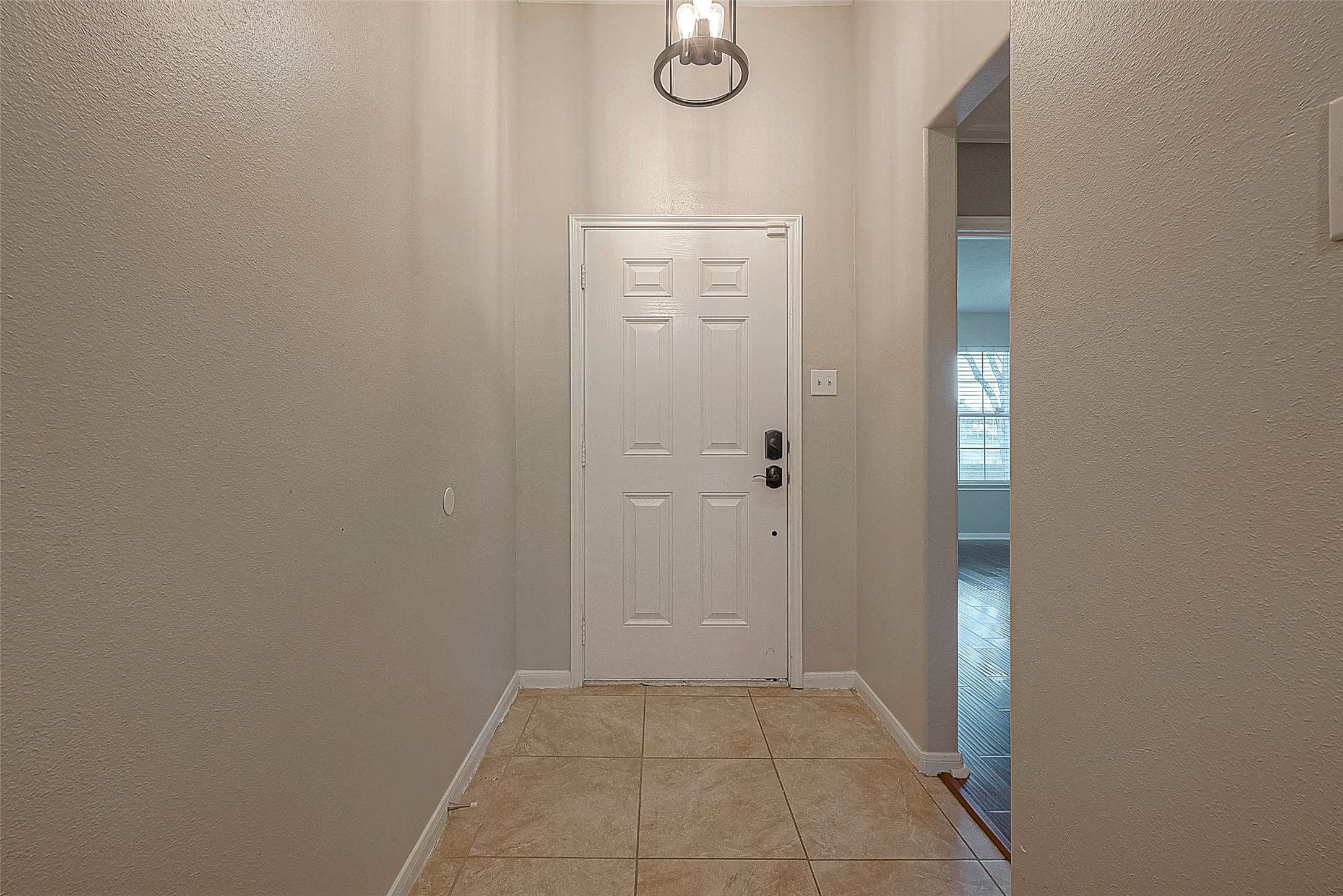 3214 Northgate Court Manvel, TX 77578 - Photo 5 of 16 View from inside looking towards front entrance. Guest bedroom to the right.