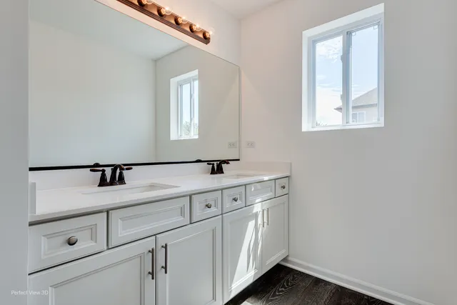 a bathroom with a toilet and a bathtub