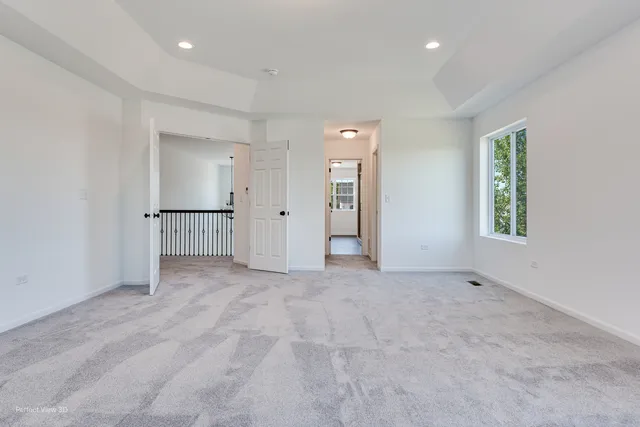 a bathroom with a granite countertop sink and a bathtub