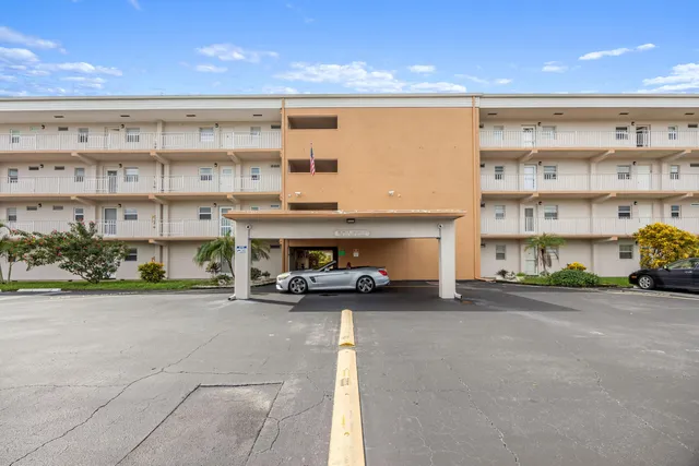 a view of an building with a flat screen tv and a fireplace