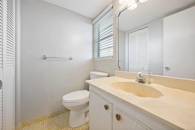 a bathroom with a sink and a toilet