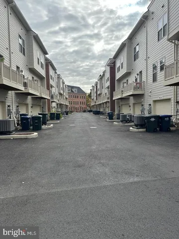 a view of a street with cars