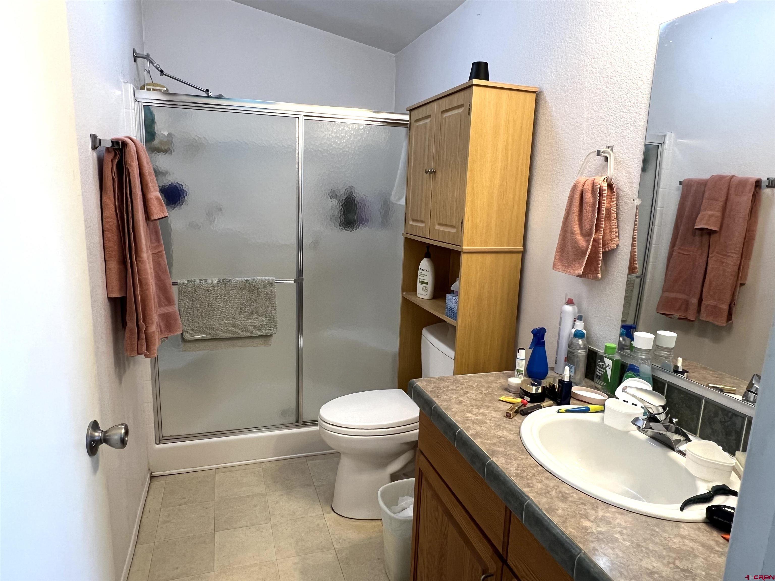 21179 Rd C.6 Cortez, CO 81321 - Photo 11 of 33 a bathroom with a sink toilet and shower
