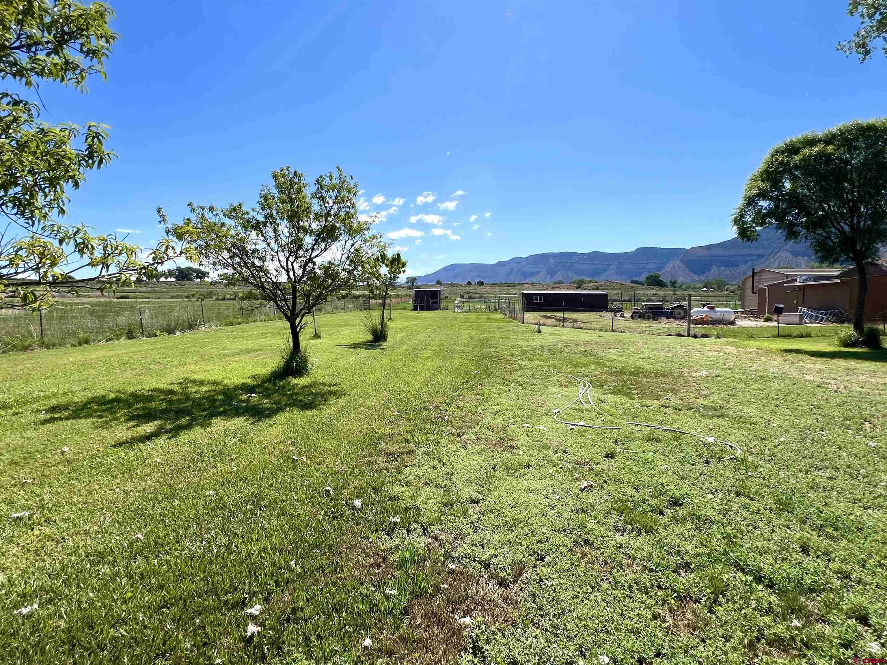 21179 Rd C.6 Cortez, CO 81321 - Photo 27 of 33 a view of a lake with a yard