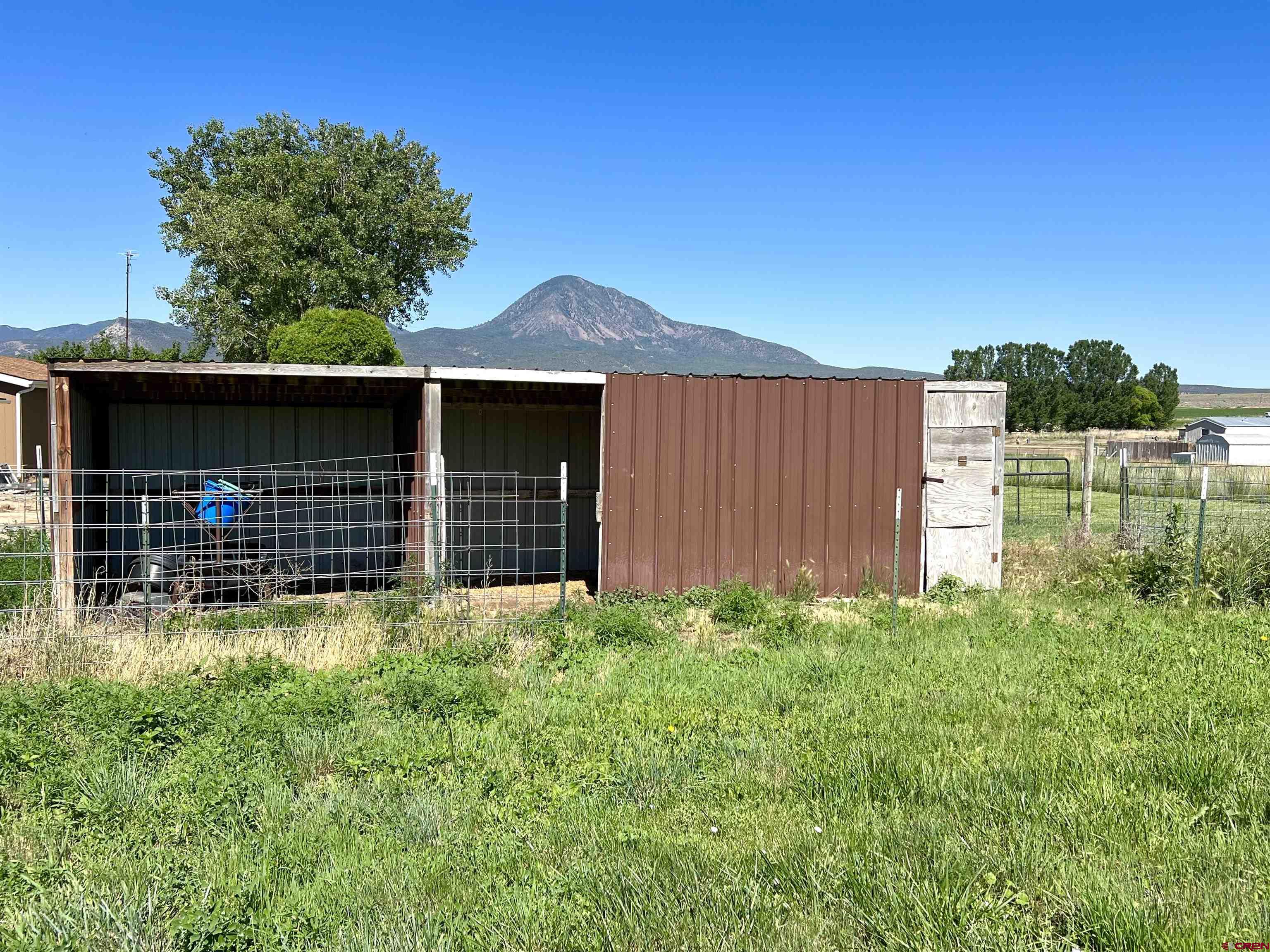 21179 Rd C.6 Cortez, CO 81321 - Photo 28 of 33 a view of a house with a garden