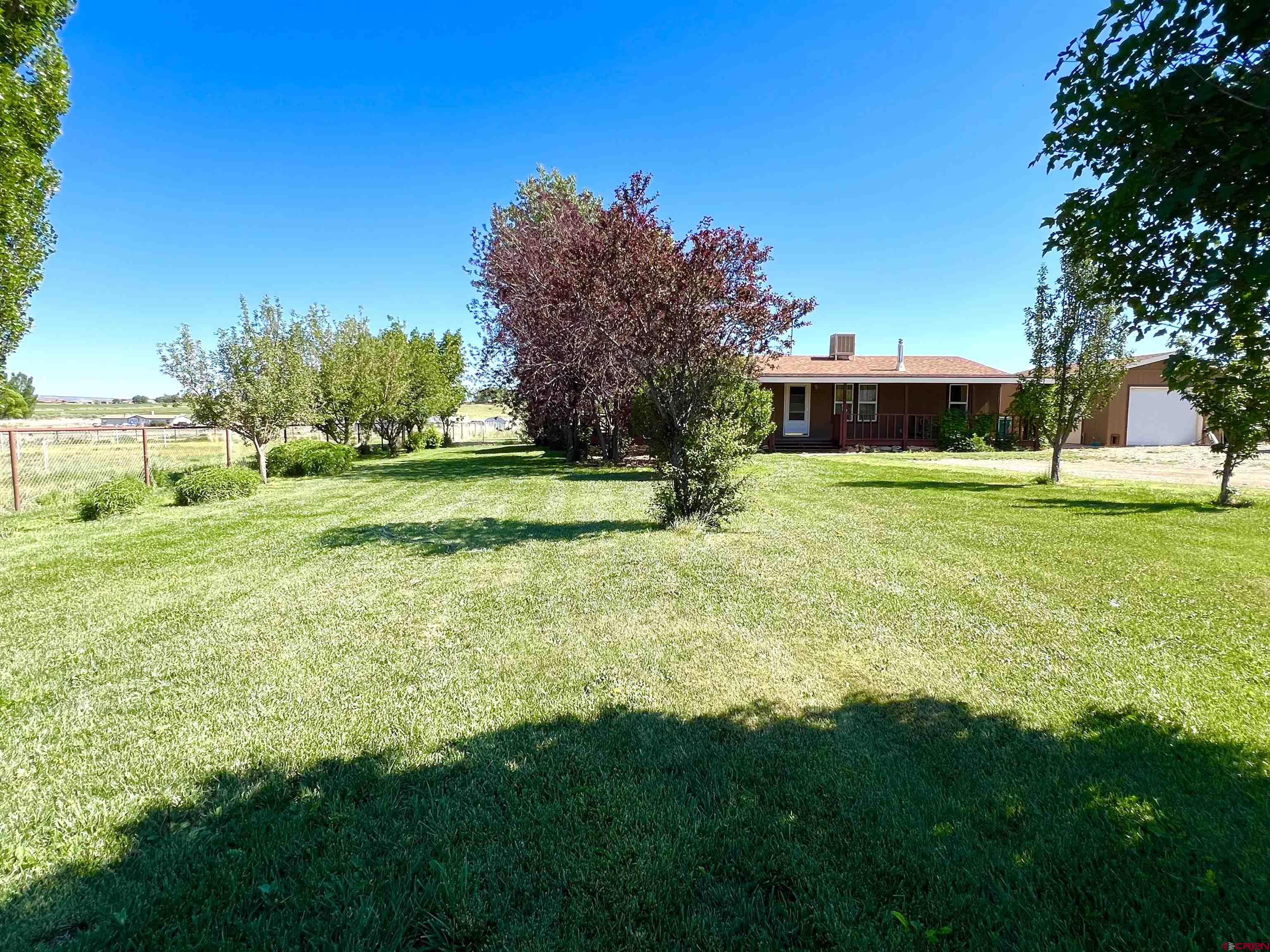 21179 Rd C.6 Cortez, CO 81321 - Photo 3 of 33 a view of a house with a big yard