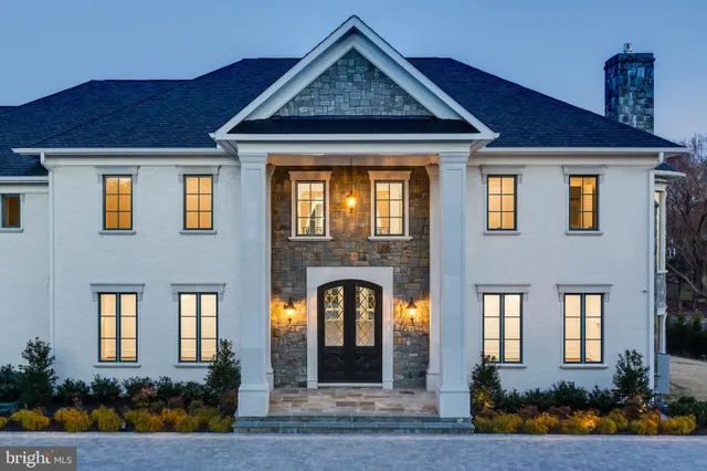 a view of a kitchen with stainless steel appliances granite countertop a stove and a sink
