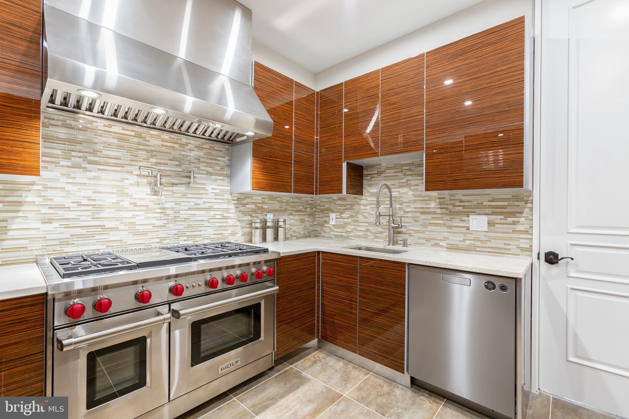 1181 Ballantrae Lane McLean, VA 22101 - Photo 43 of 85 a view of a kitchen with stainless steel appliances granite countertop a stove and a sink