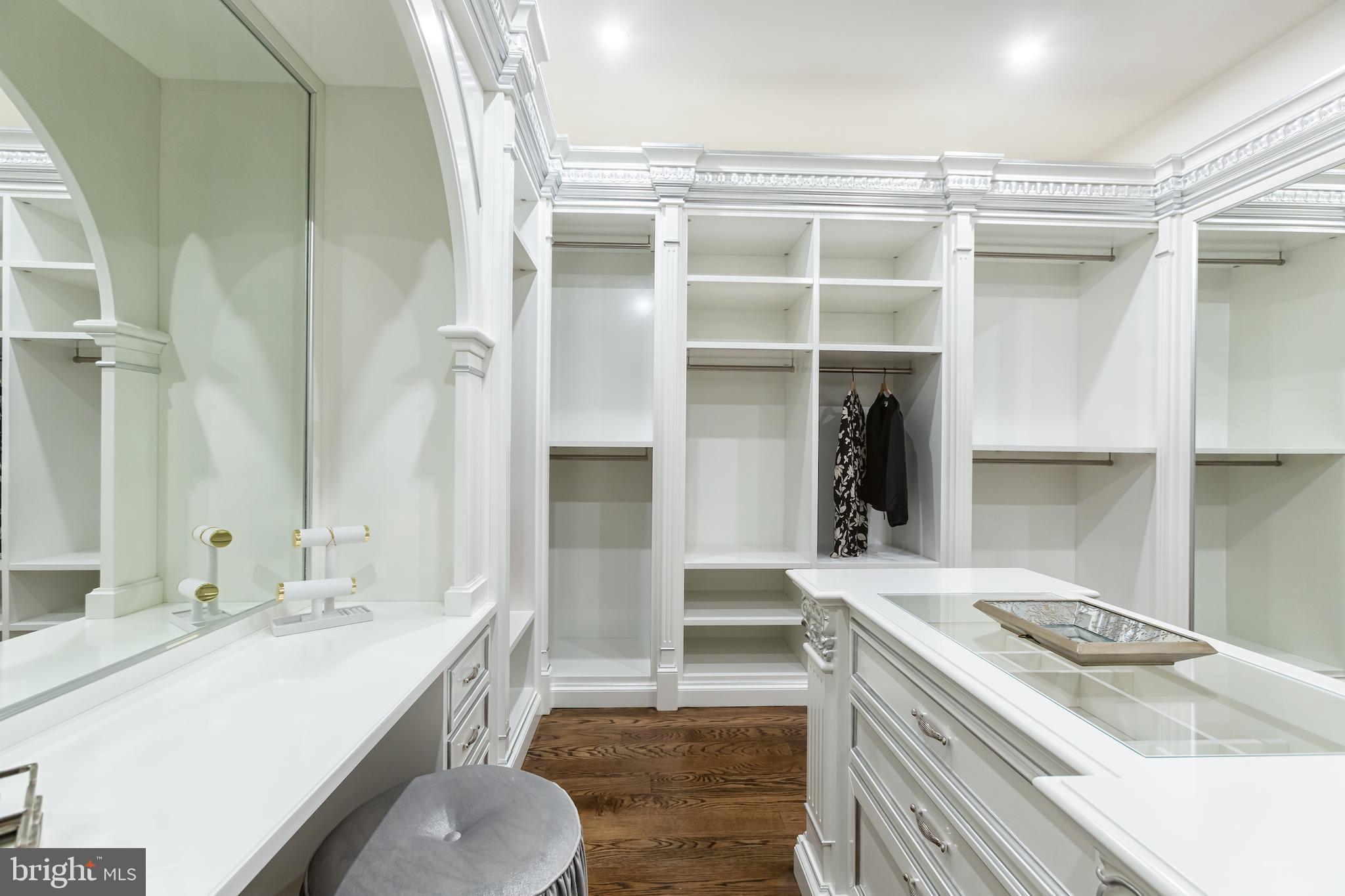 1181 Ballantrae Lane McLean, VA 22101 - Photo 52 of 85 a kitchen with a sink stove and wooden cabinets
