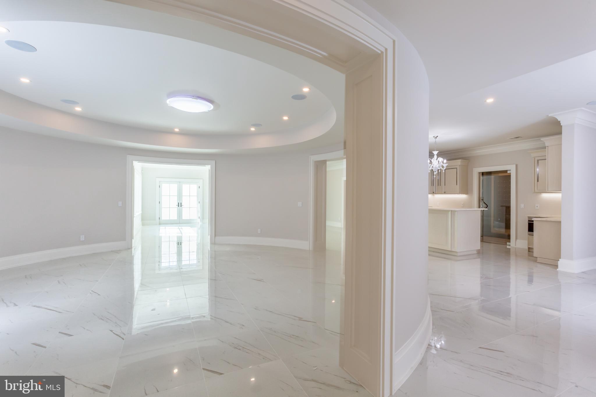 1181 Ballantrae Lane McLean, VA 22101 - Photo 59 of 85 a view of a bathroom with a glass door shower