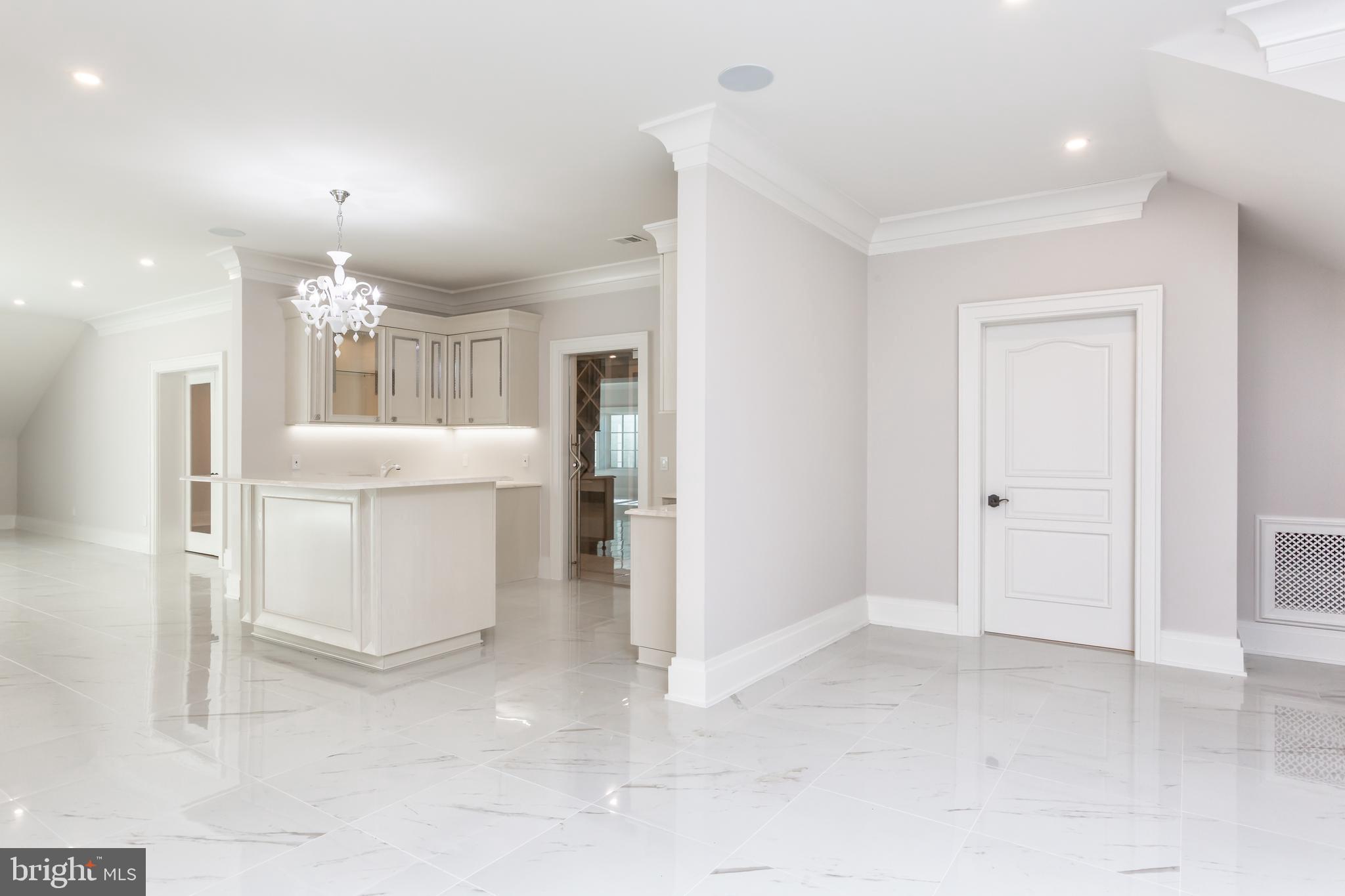 1181 Ballantrae Lane McLean, VA 22101 - Photo 60 of 85 a view of a kitchen with a refrigerator and a sink