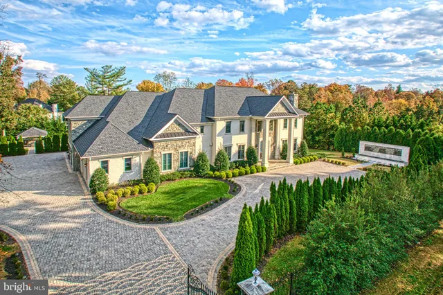a bedroom with furniture and a chandelier