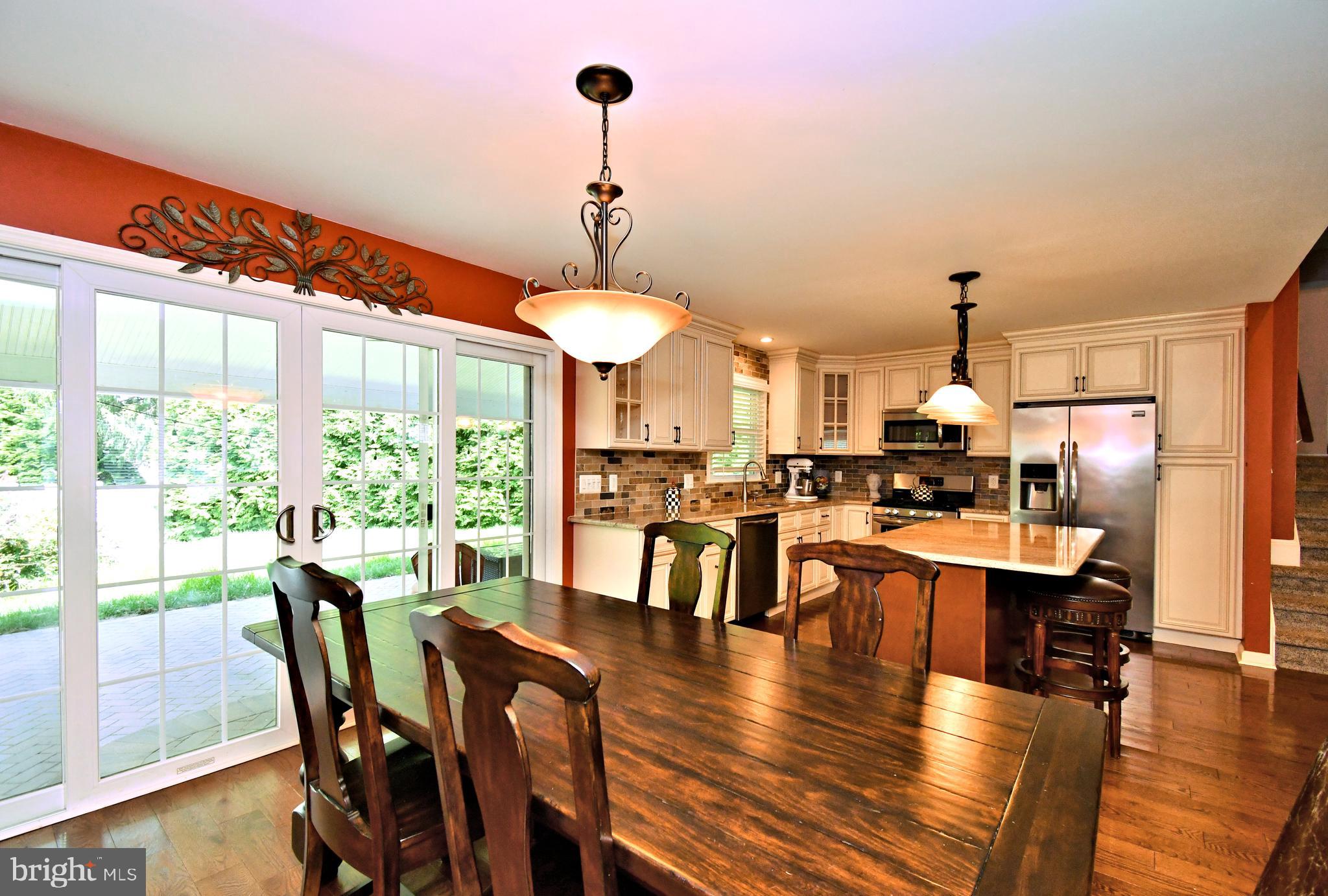 1014 Anna Road Huntingdon Valley, PA 19006 - Photo 21 of 54 a view of a dining room with furniture window and wooden floor