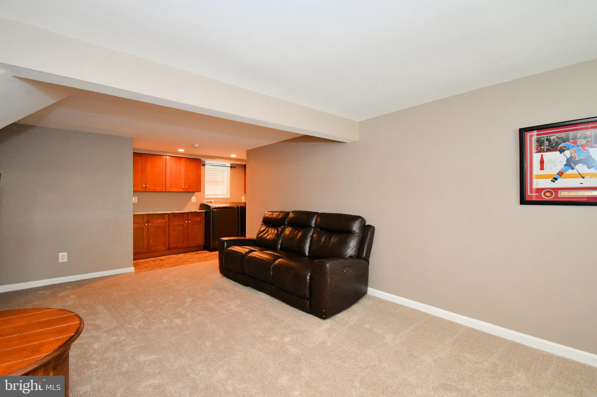 1014 Anna Road Huntingdon Valley, PA 19006 - Photo 27 of 54 a living room with furniture and a kitchen