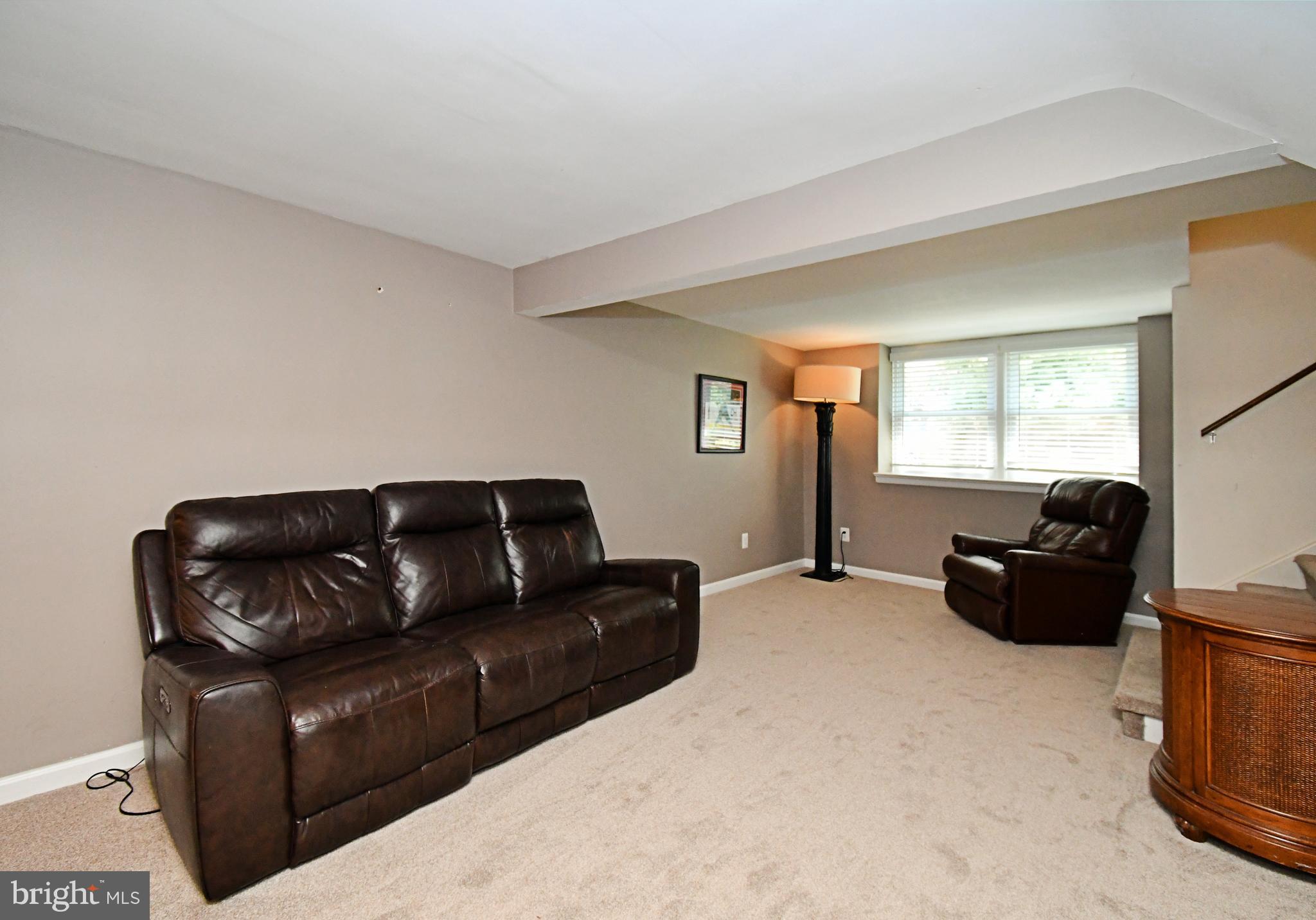 1014 Anna Road Huntingdon Valley, PA 19006 - Photo 29 of 54 a living room with furniture window and dresser
