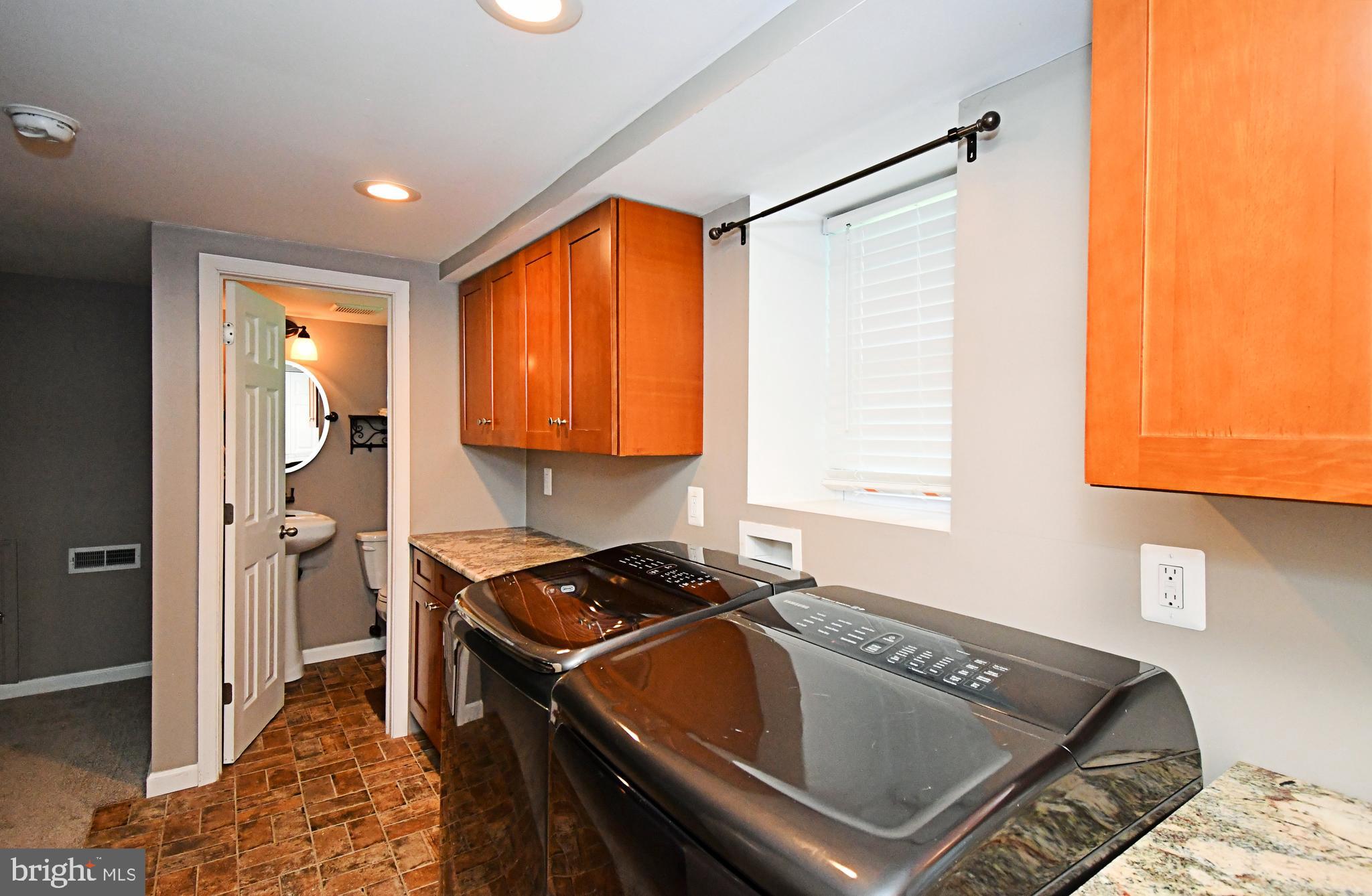 1014 Anna Road Huntingdon Valley, PA 19006 - Photo 33 of 54 a kitchen that has a sink and a stove in it