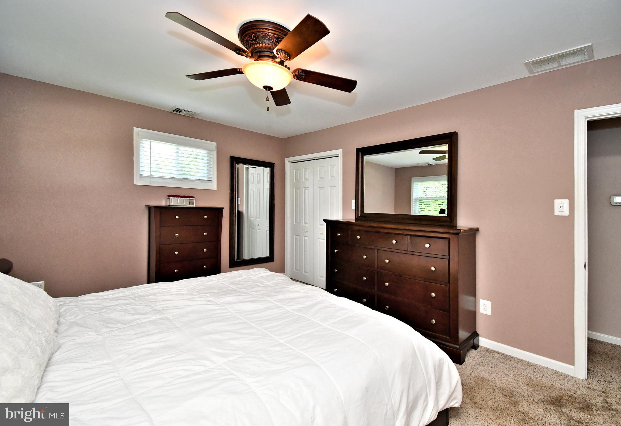 1014 Anna Road Huntingdon Valley, PA 19006 - Photo 47 of 54 a bedroom with a bed and a flat screen tv