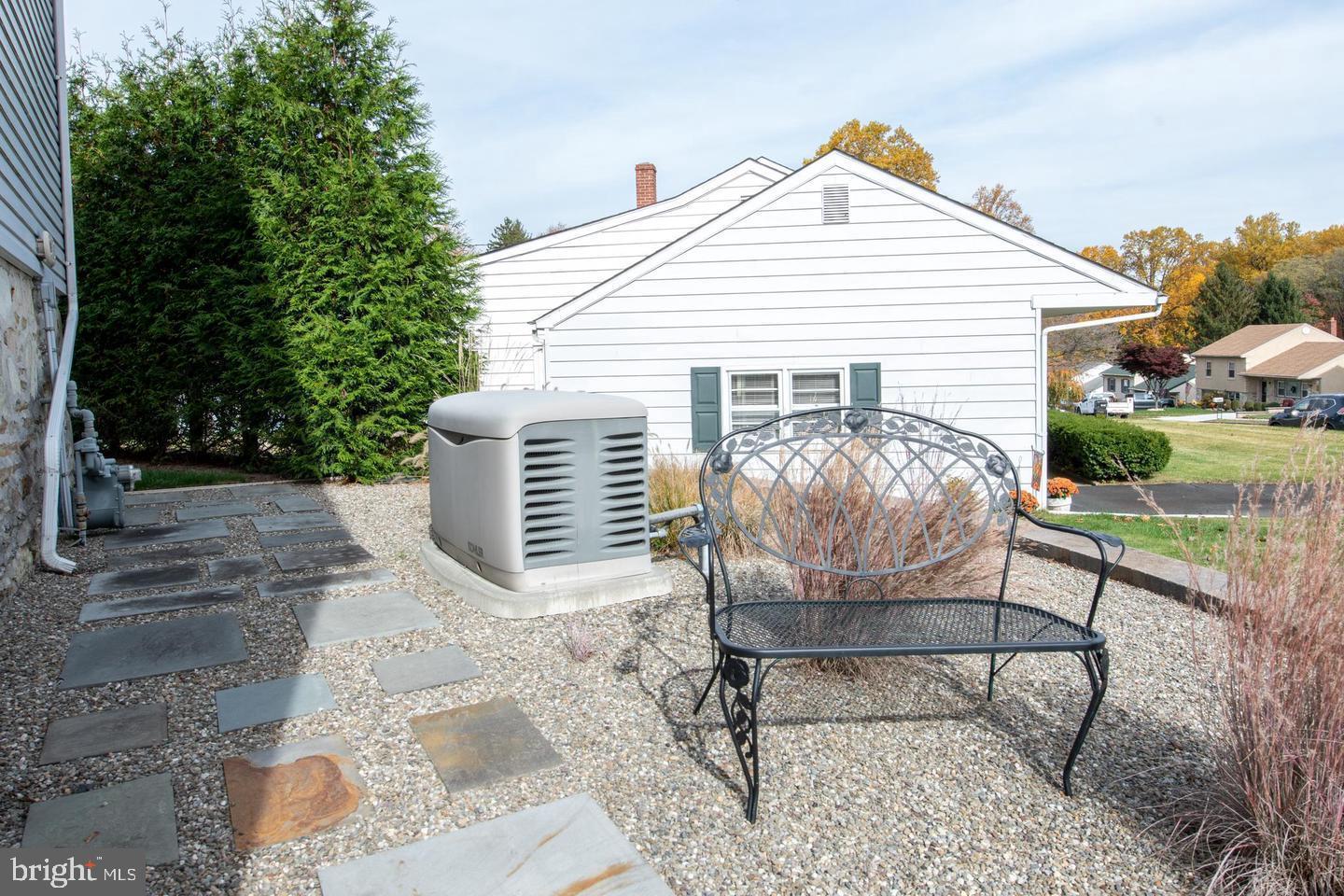 1014 Anna Road Huntingdon Valley, PA 19006 - Photo 54 of 54 a view of a chairs and table in backyard