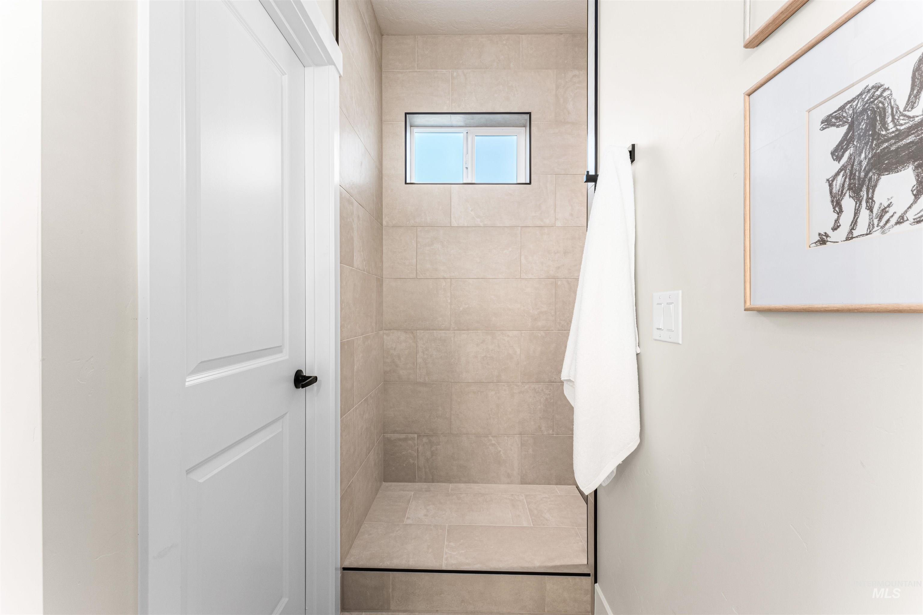 2787 West Warlander Street Meridian, ID 83642 - Photo 19 of 34 Full bath with tiled shower