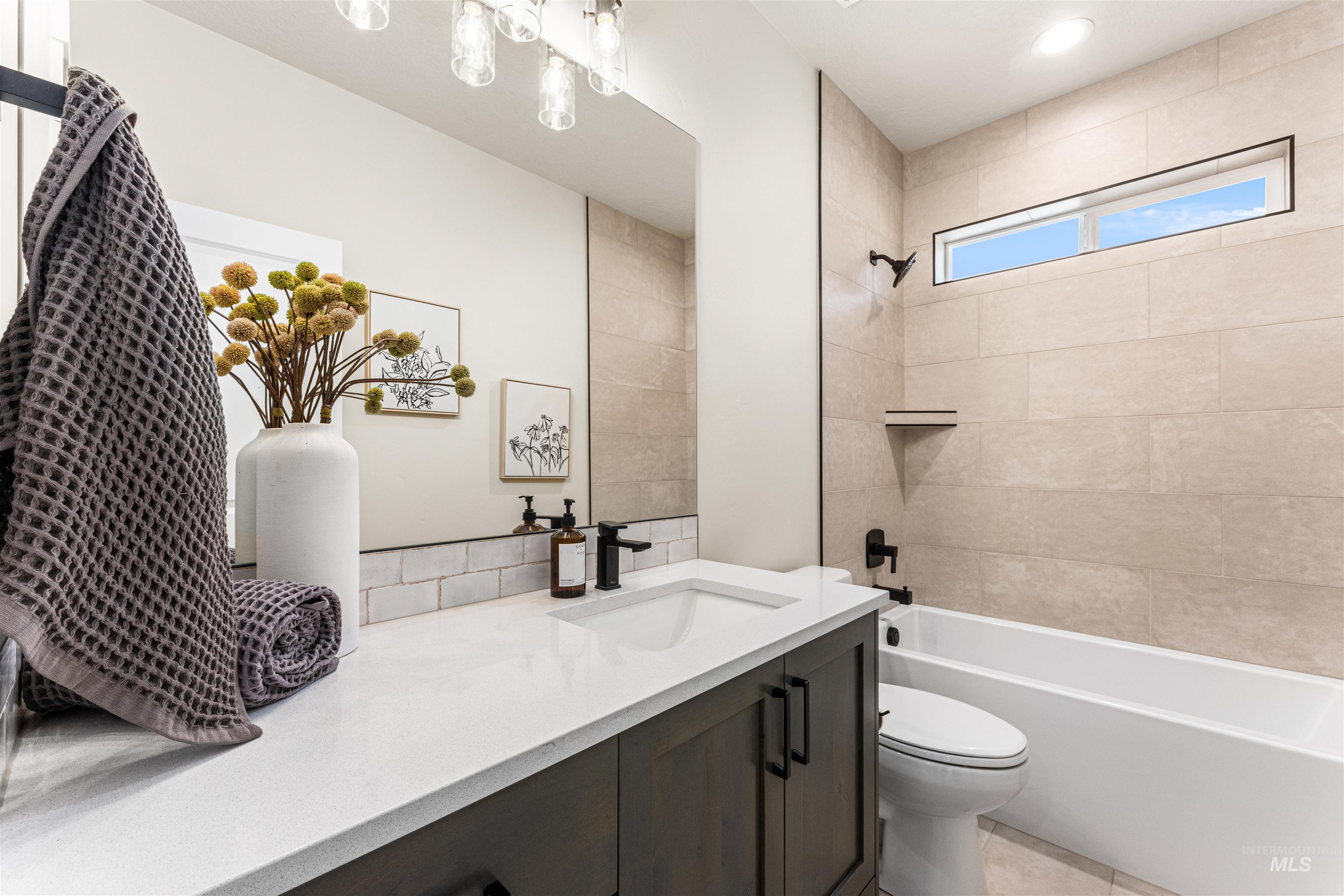 2787 West Warlander Street Meridian, ID 83642 - Photo 25 of 34 Bathroom with vanity, shower / bath combination, recessed lighting, and light tile patterned floors