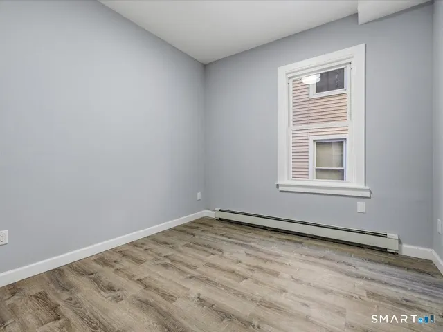 a view of a room with a window