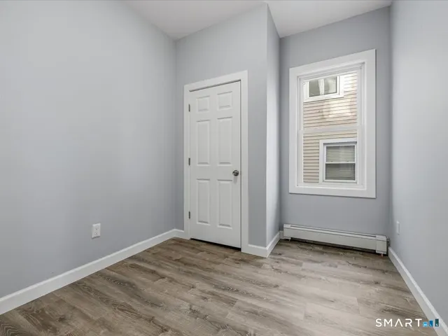 wooden floor and window in a room