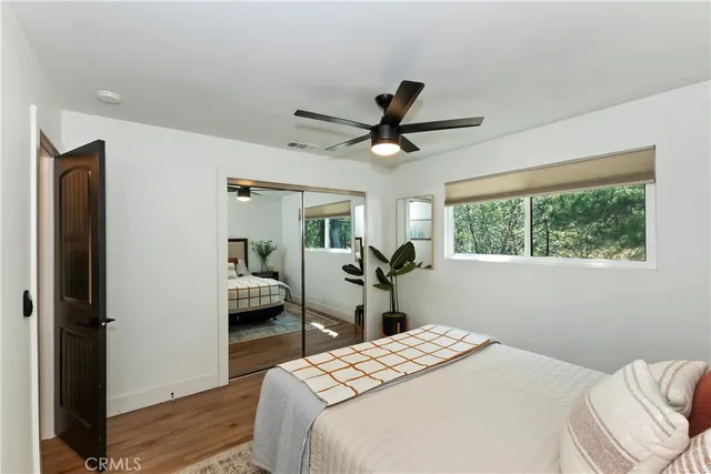 a bathroom with a toilet a sink and shower